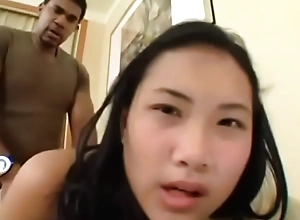 Young Thai girl Nat gets pumped full be incumbent on African semen