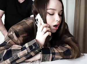 Fucking my stepsister while she's on the phone.